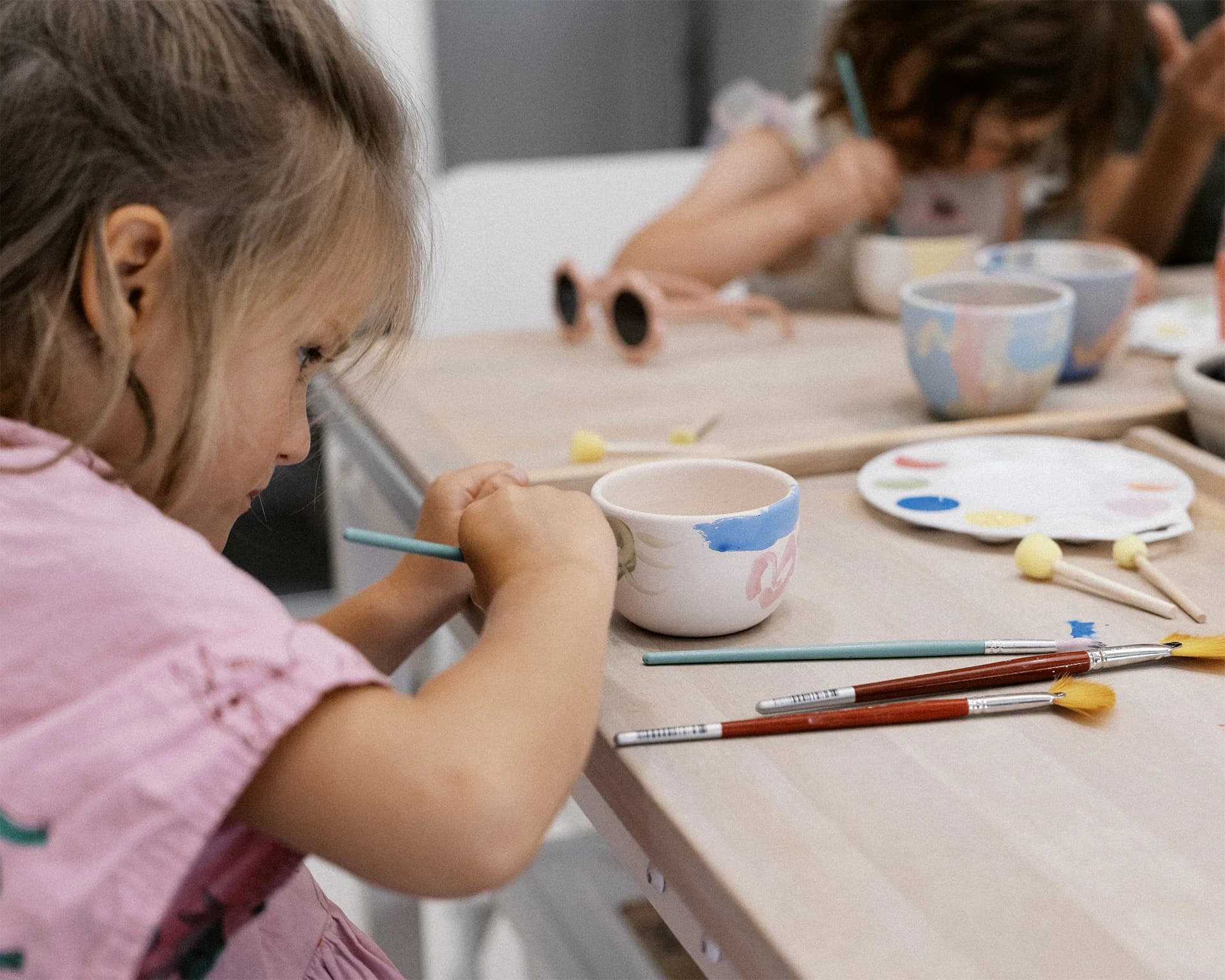Kids and parents creating at KERA mini